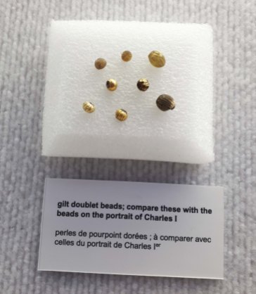Identical beads on display in the Colony of Avalon Visitor's Centre. Photo by author, 2017